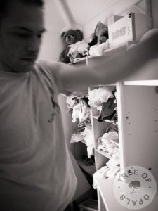 The Viking setting up the changing station and my cloth nappy stash