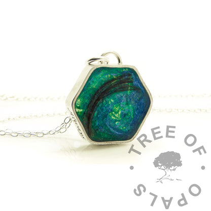 Hexagonal pendant with blue and green marbled design on a white background, branded 'Tree of Opals'.