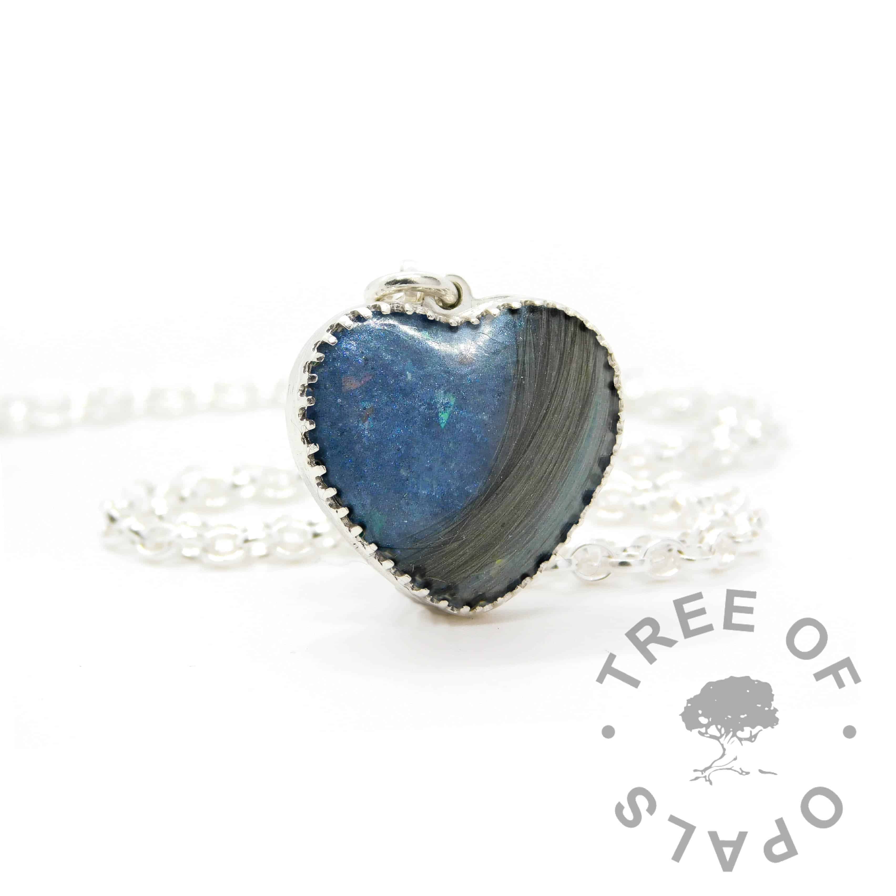 New style heart necklace setting with scalloped edge. Aegean blue resin sparkle mix, lock of hair, shown with a medium classic chain upgrade (mockup of new setting)