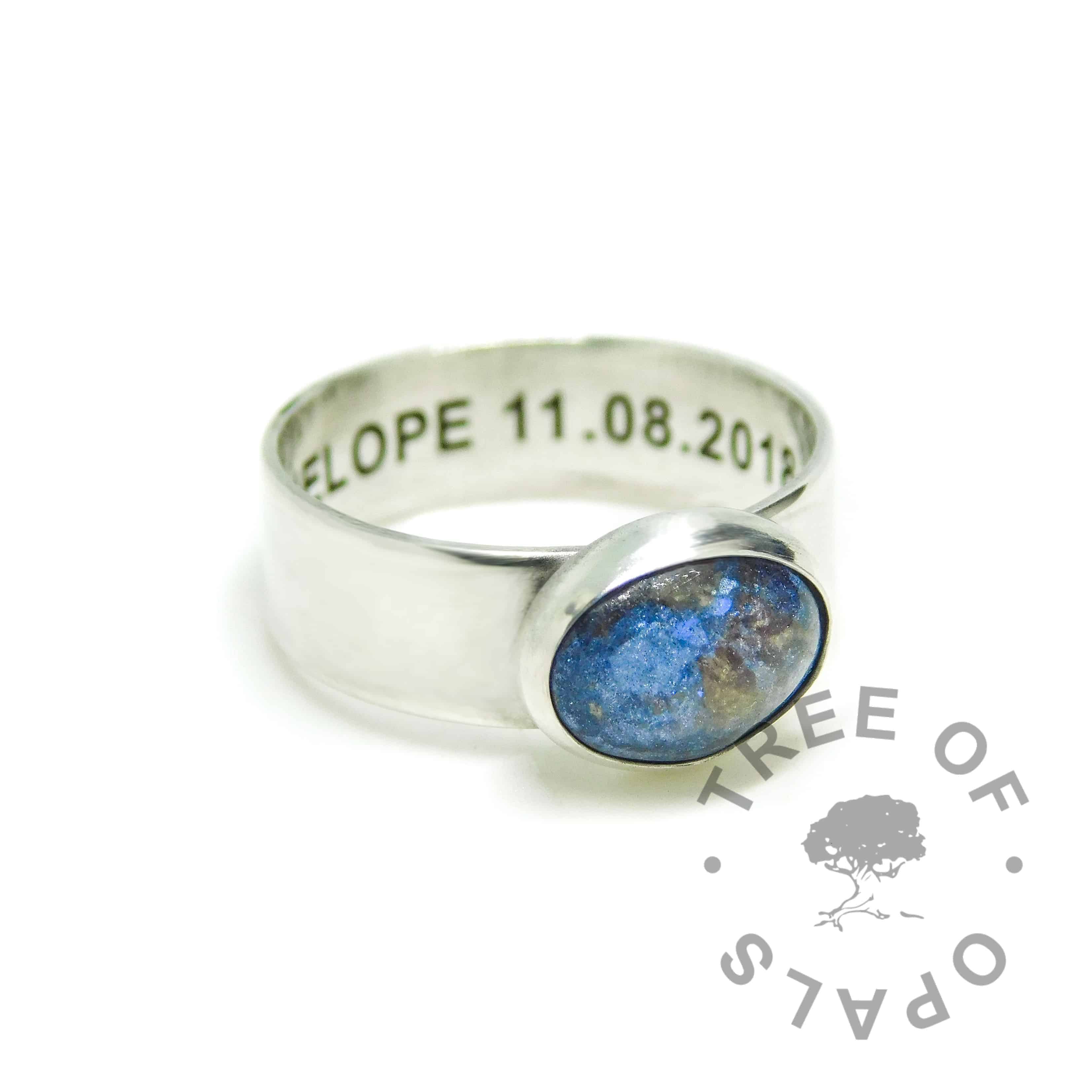 Aegean blue umbilical cord ring on 6mm shiny band. Solid 925 sterling EcoSilver handmade ring with engraved text on the inside of the band, in Arial font. 10x8mm bezel cup rubbed over the cabochon for security.