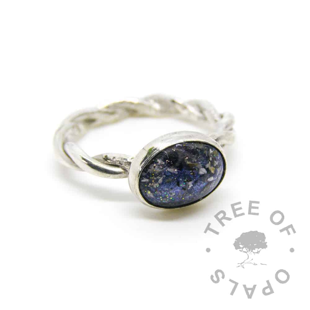 Aegean blue cremation ash ring on twisted band