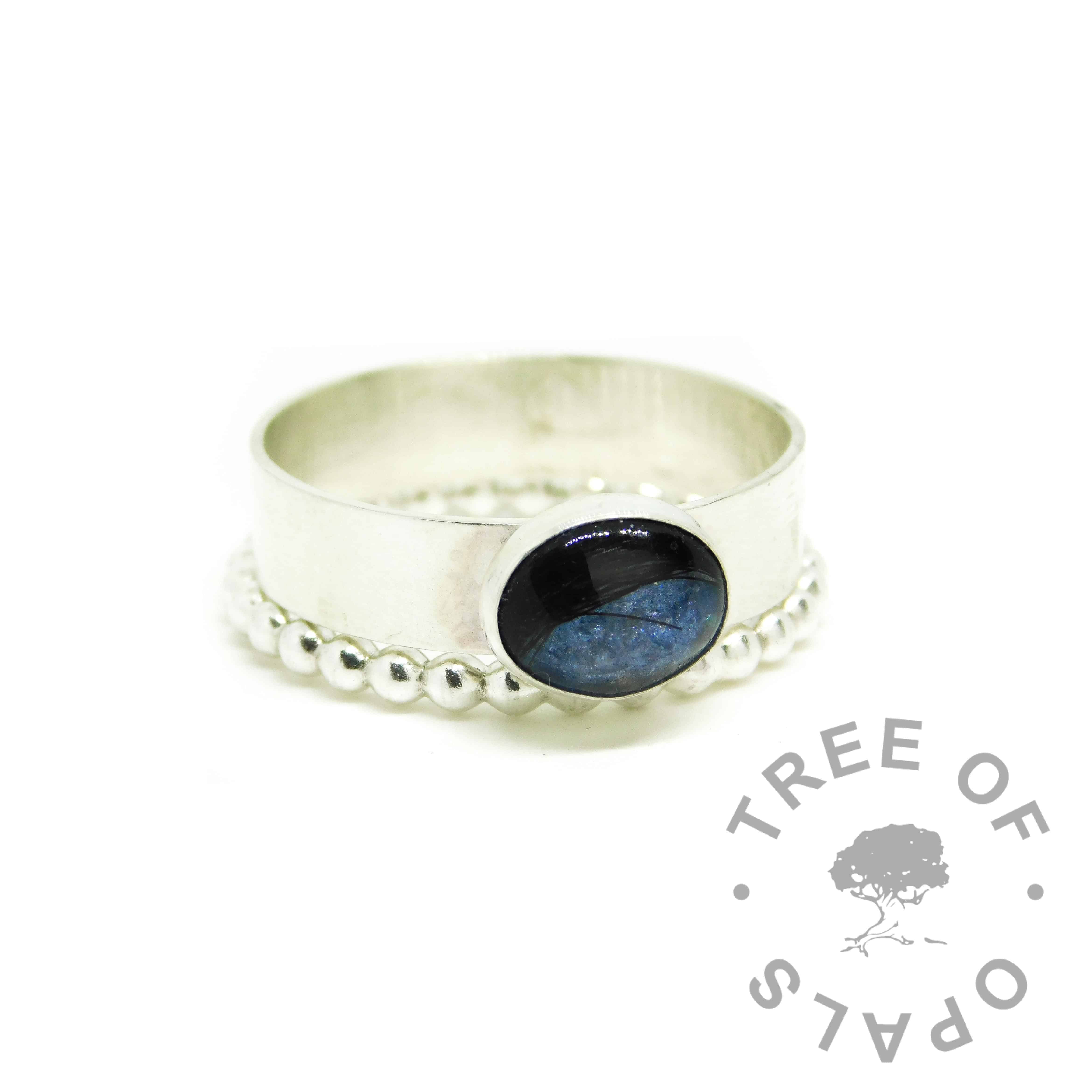 blue hair ring, lock of hair ring on 6mm shiny band. Aegean blue resin sparkle mix, shown with bubble wire stacker