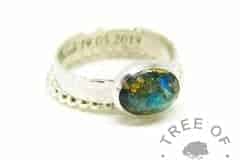 blue green cord ring, umbilical cord with green and blue plus gold leaf. Engraved inside in Amazone BT font. Textured band. Ahown with a bubble wire slim stacking band