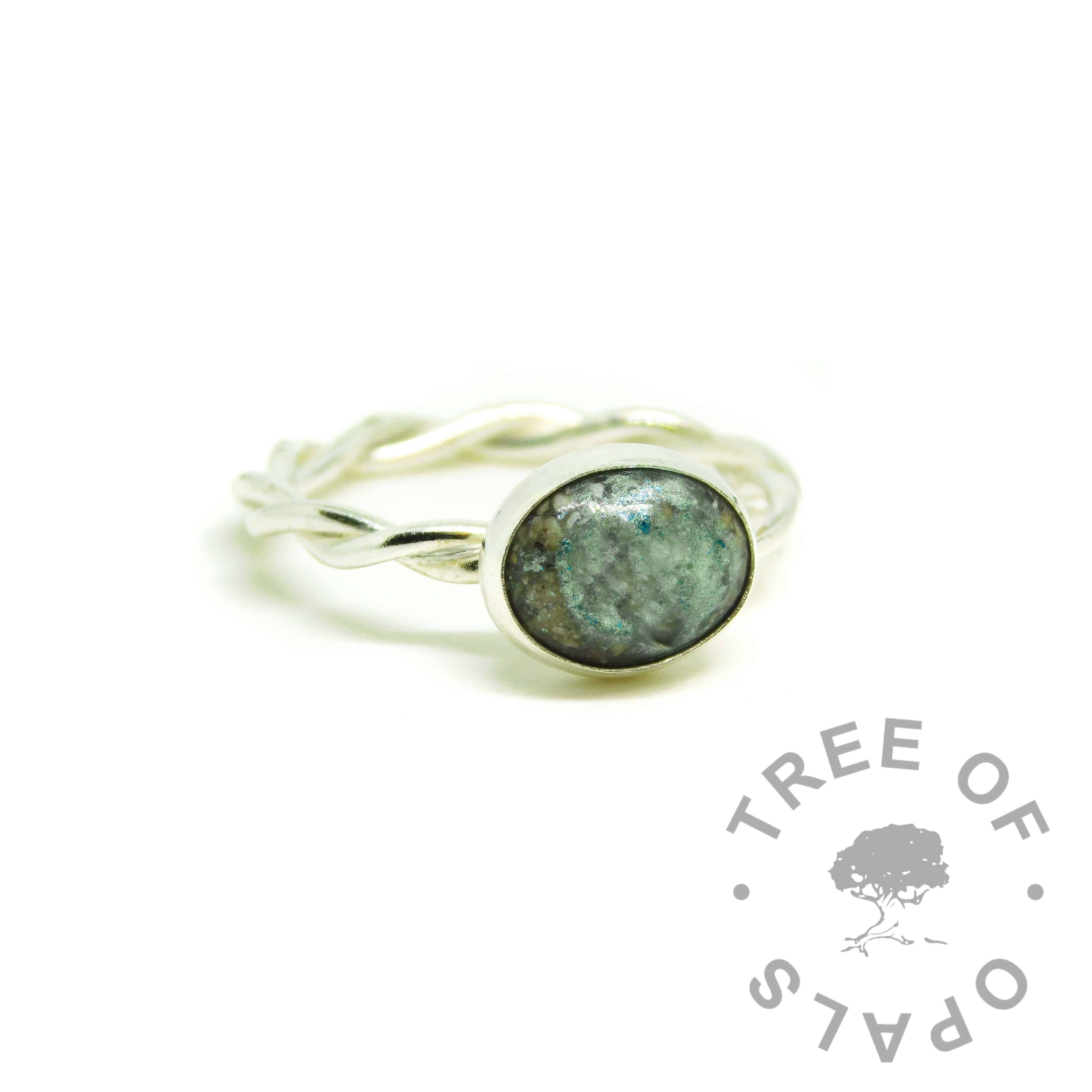 aqua ashes ring, cremation ashes ring on twisted band. Angelic aqua resin sparkle mix