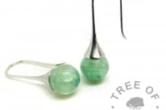 White/clear see-through hair, mystery piece lock of hair earrings. Angelic Aqua Resin Sparkle Mix
