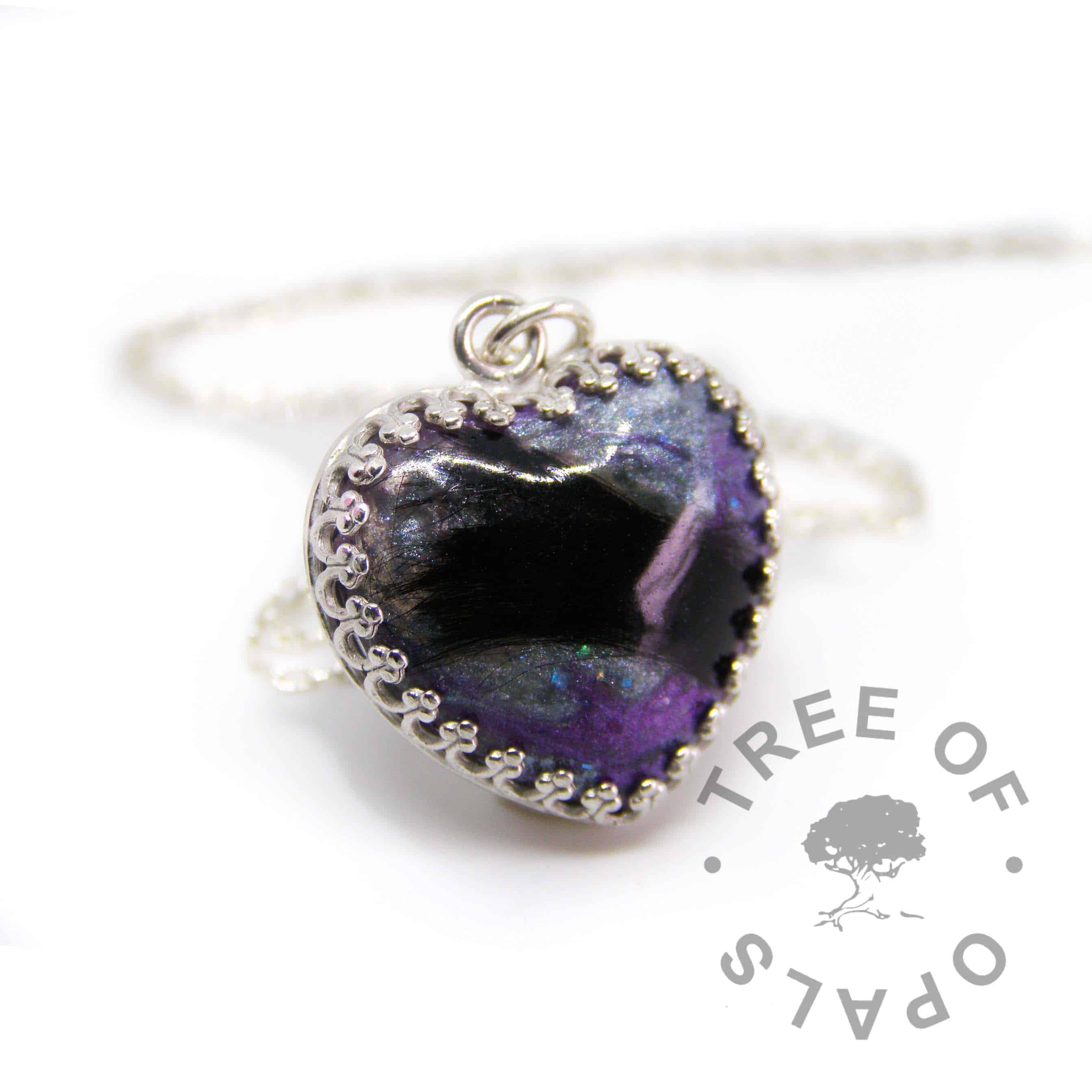 lock of hair heart necklace mermaid teal and black fur, with a little deep purple colour. Solid sterling silver with a 20" fine weight chain (50cm)