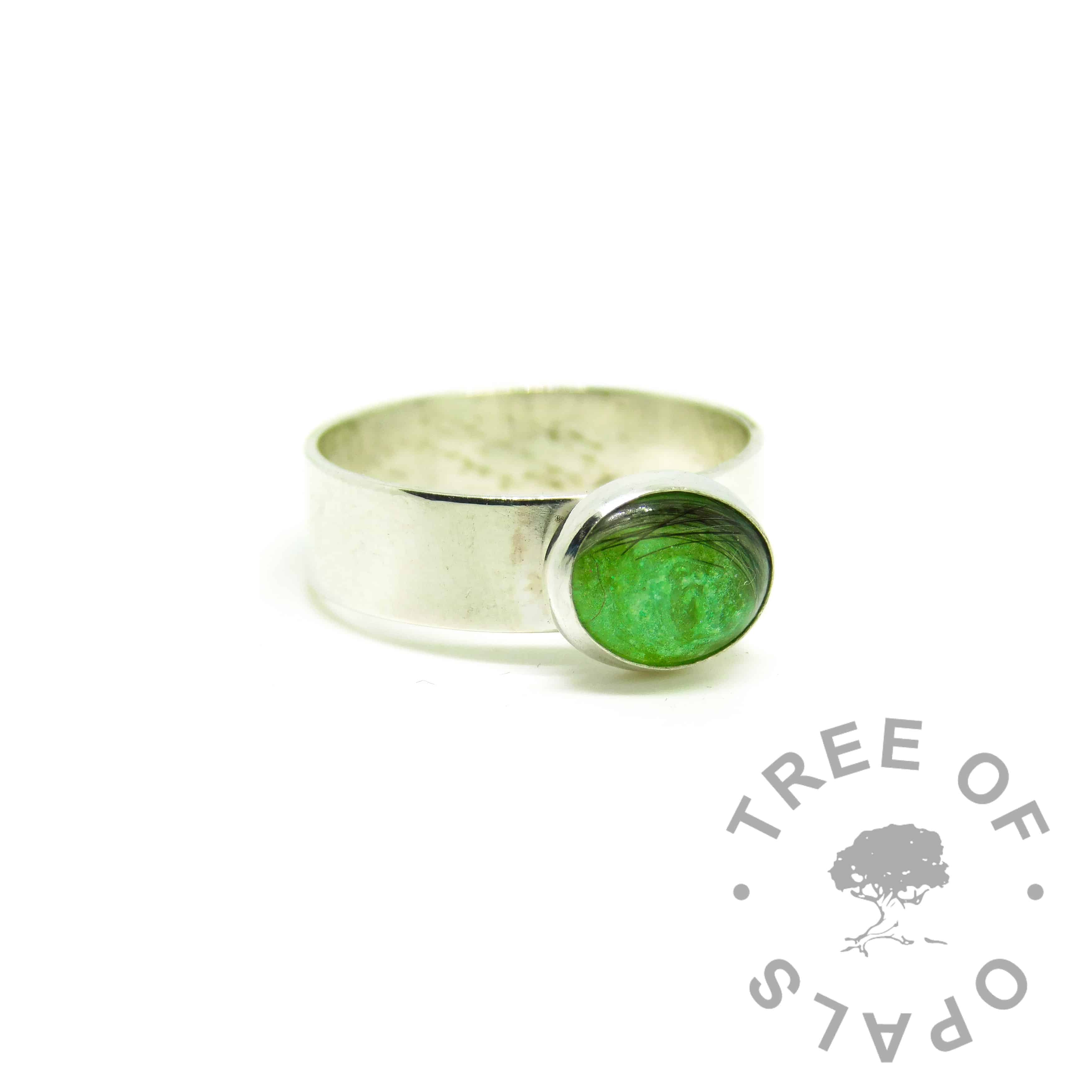 hair jewellery green ring, 6mm shiny Argentium silver band. Lock of hair with basilisk green resin sparkle mix