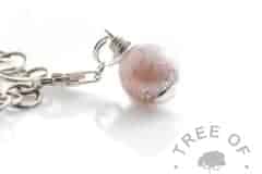 breasmilk and fairy pink resin sparkle mix orb with lobster clasp setting and silver leaf, celebrating 6 months' breastfeeding (six month boobie award)