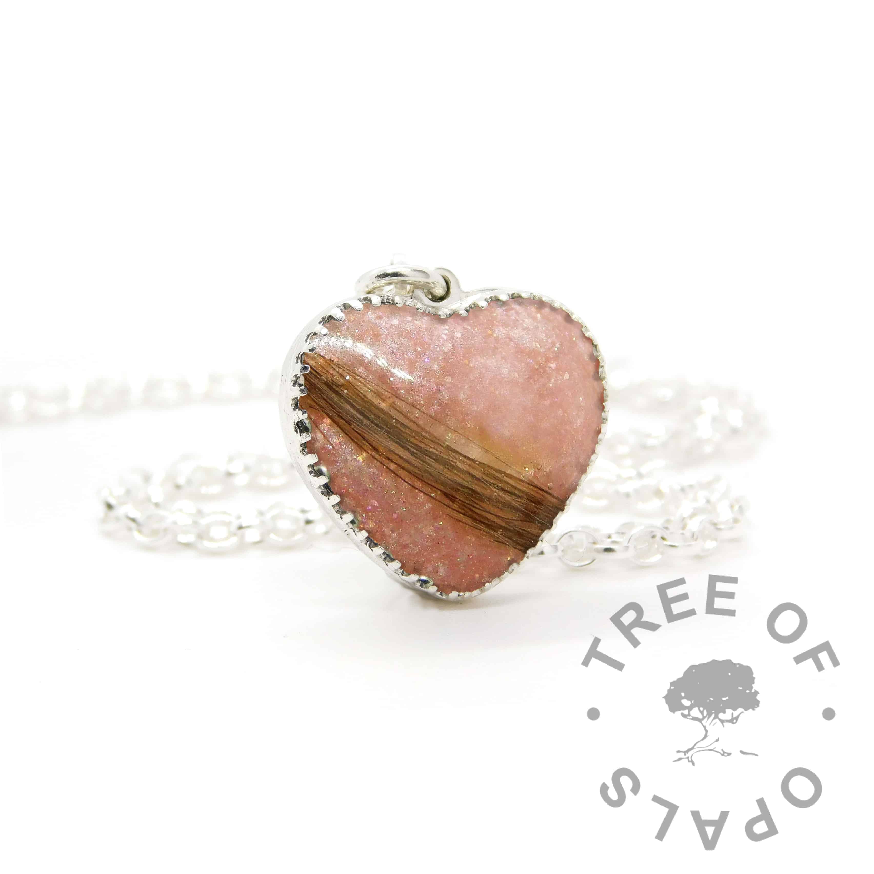 New style heart necklace setting with scalloped edge. Fairy pink resin sparkle mix, lock of hair, shown with a medium classic chain upgrade (mockup of new setting)
