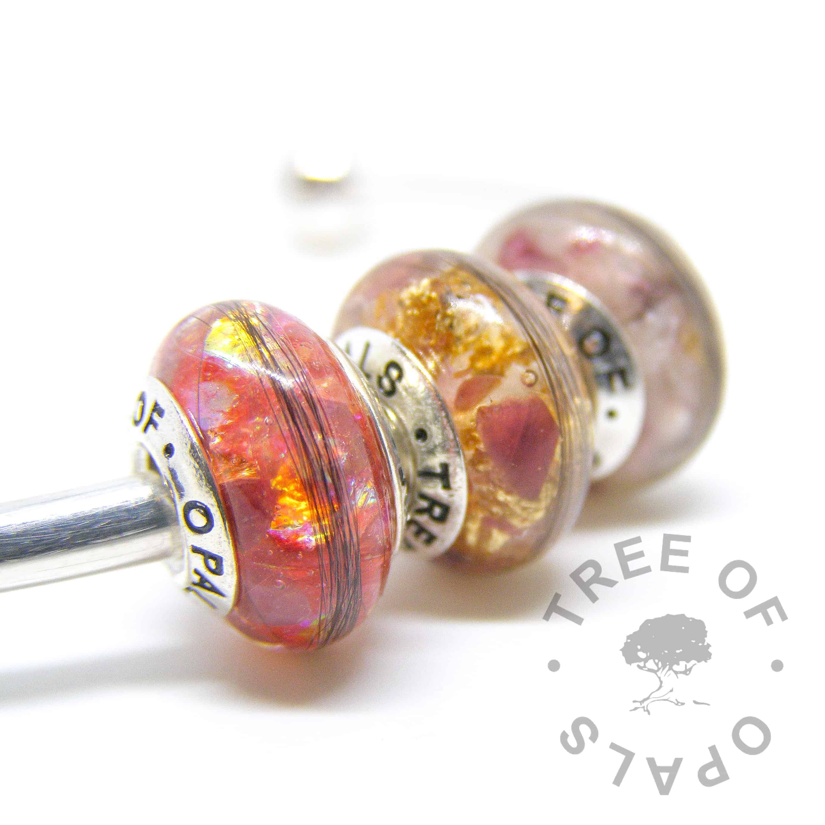 lock of hair charm bead trio in resin, ruby July birthstone, red opalescent flakes and genuine gold leaf with solid sterling silver Tree of Opals branded cores
