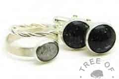 cremation ashes cufflinks with Vampire Black Resin Sparkle Mix and a unicorn white ring on brushed band shown with a twisted band slim stacking ring