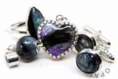 lock of hair family order mermaid teal and a little deep purple. Pearl, marquise ring, heart necklace and cufflinks