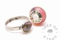 family order lock of hair ring and charm fairy pink sparkles and blue topaz December birthstone and solid silver settings