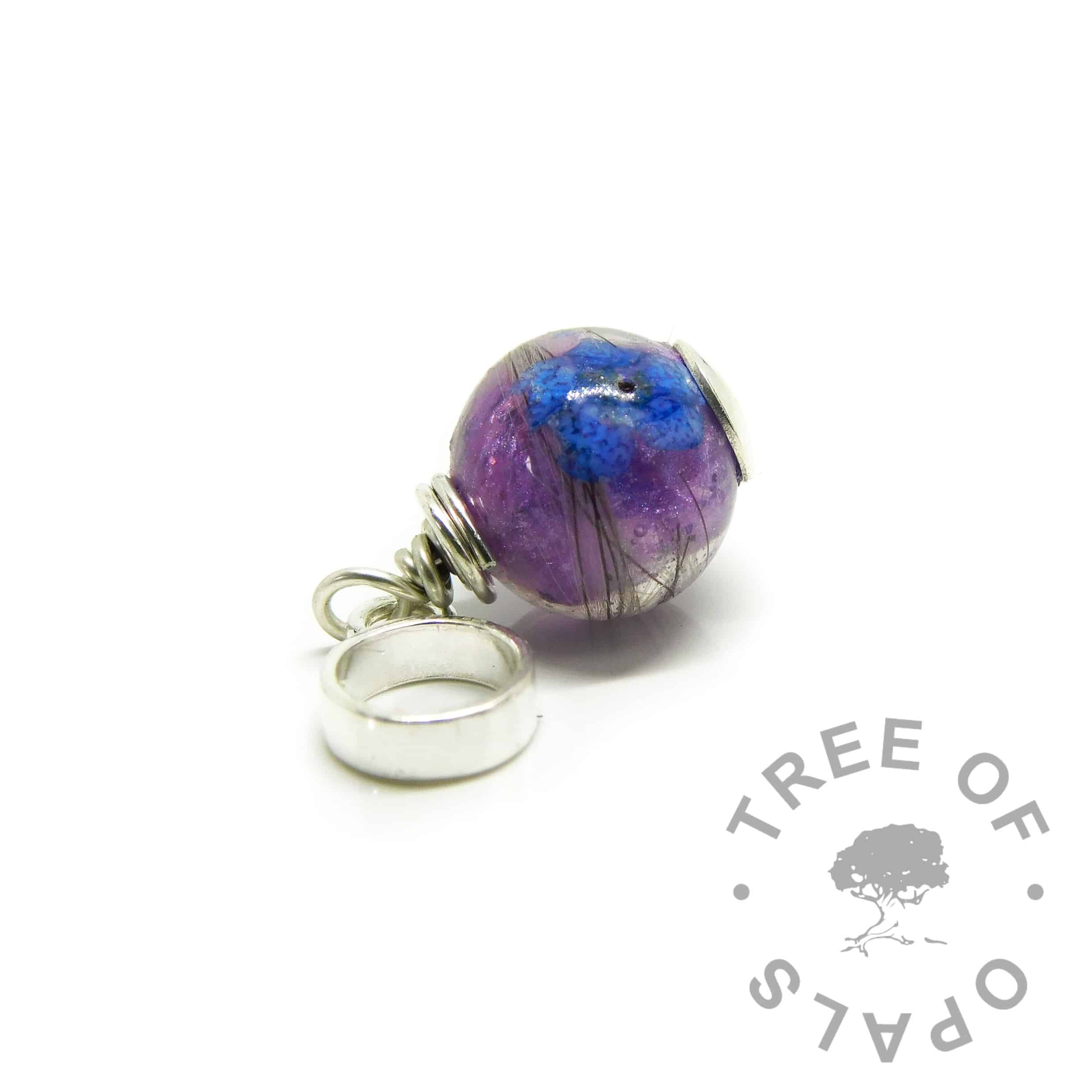 Hair orb with orchid purple and forget me not, shown on a European setting dangle charm for Pandora bracelets
