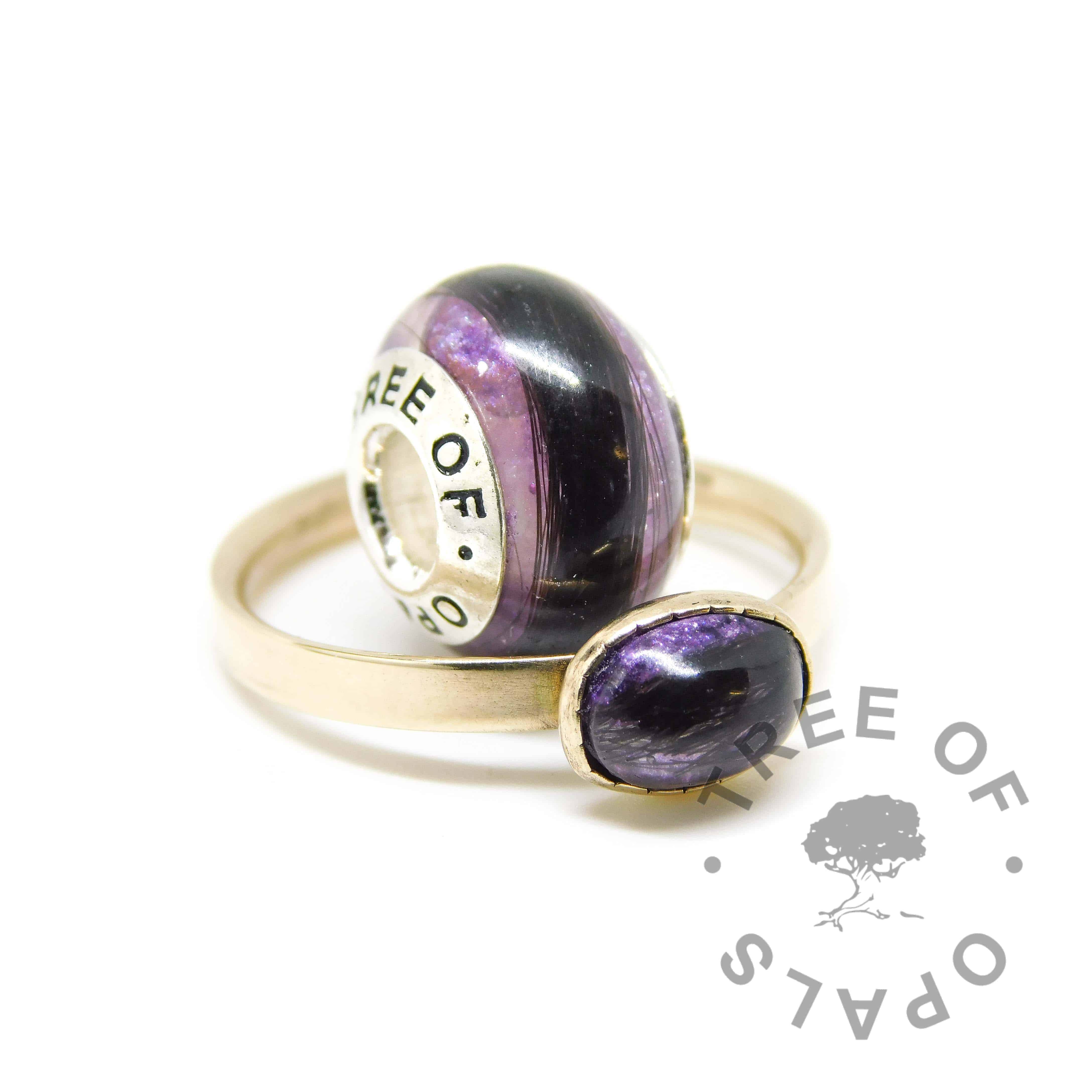 solid gold ring and charm with orchid purple resin and July birthstone ruby