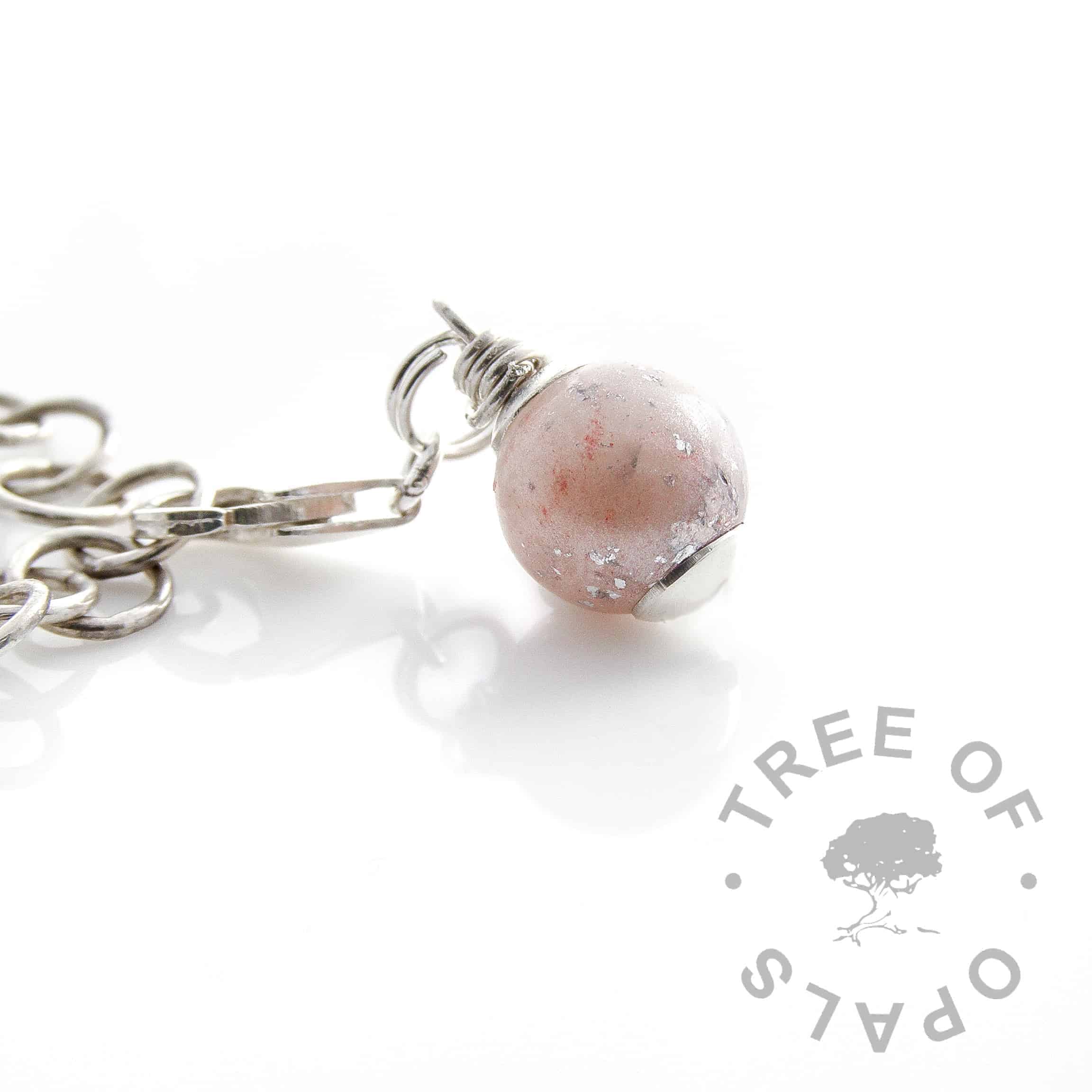breasmilk and fairy pink resin sparkle mix orb with lobster clasp setting and silver leaf, celebrating 6 months' breastfeeding (six month boobie award)