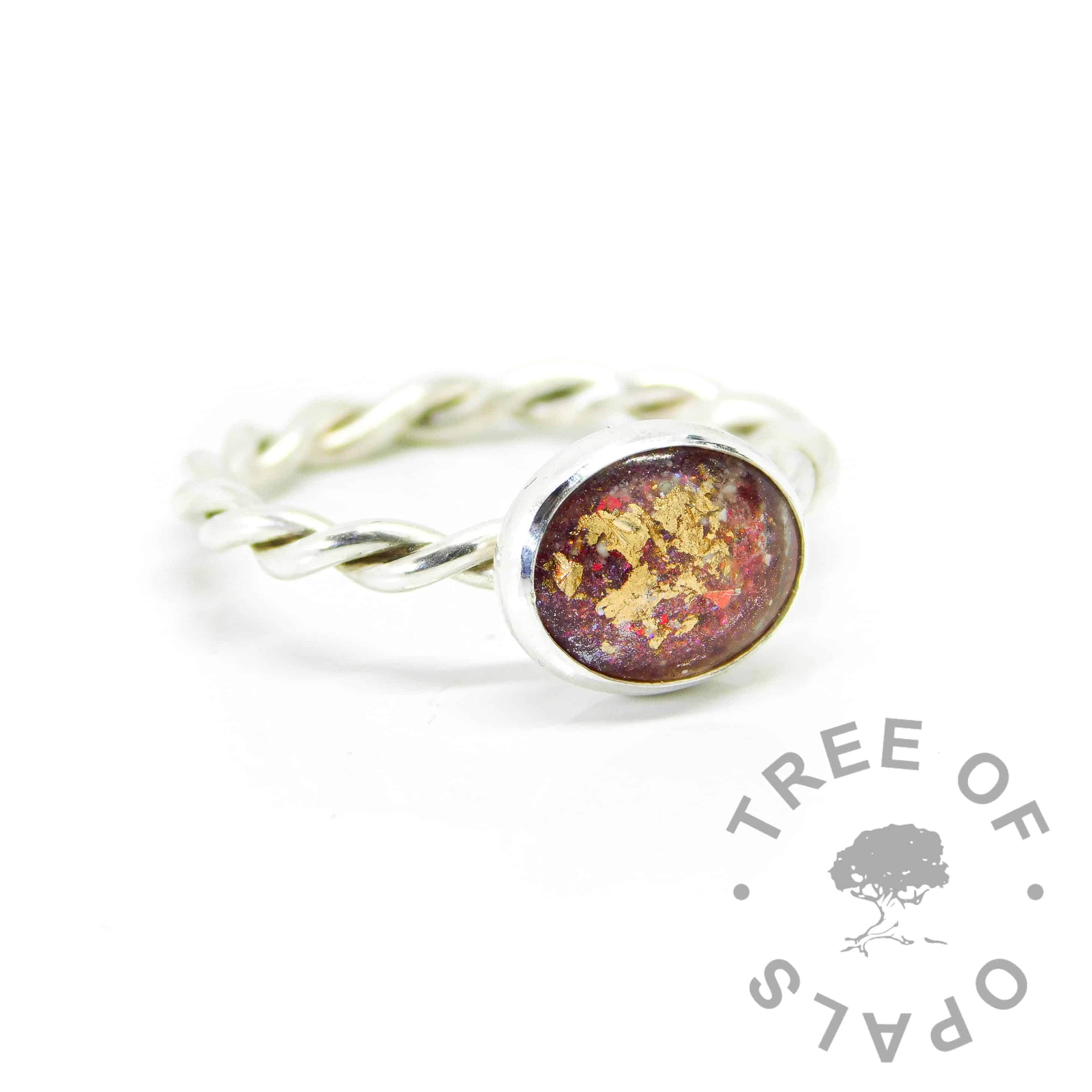Ashes ring on twisted band with dragon's blood red resin sparkle mix and rose gold leaf
