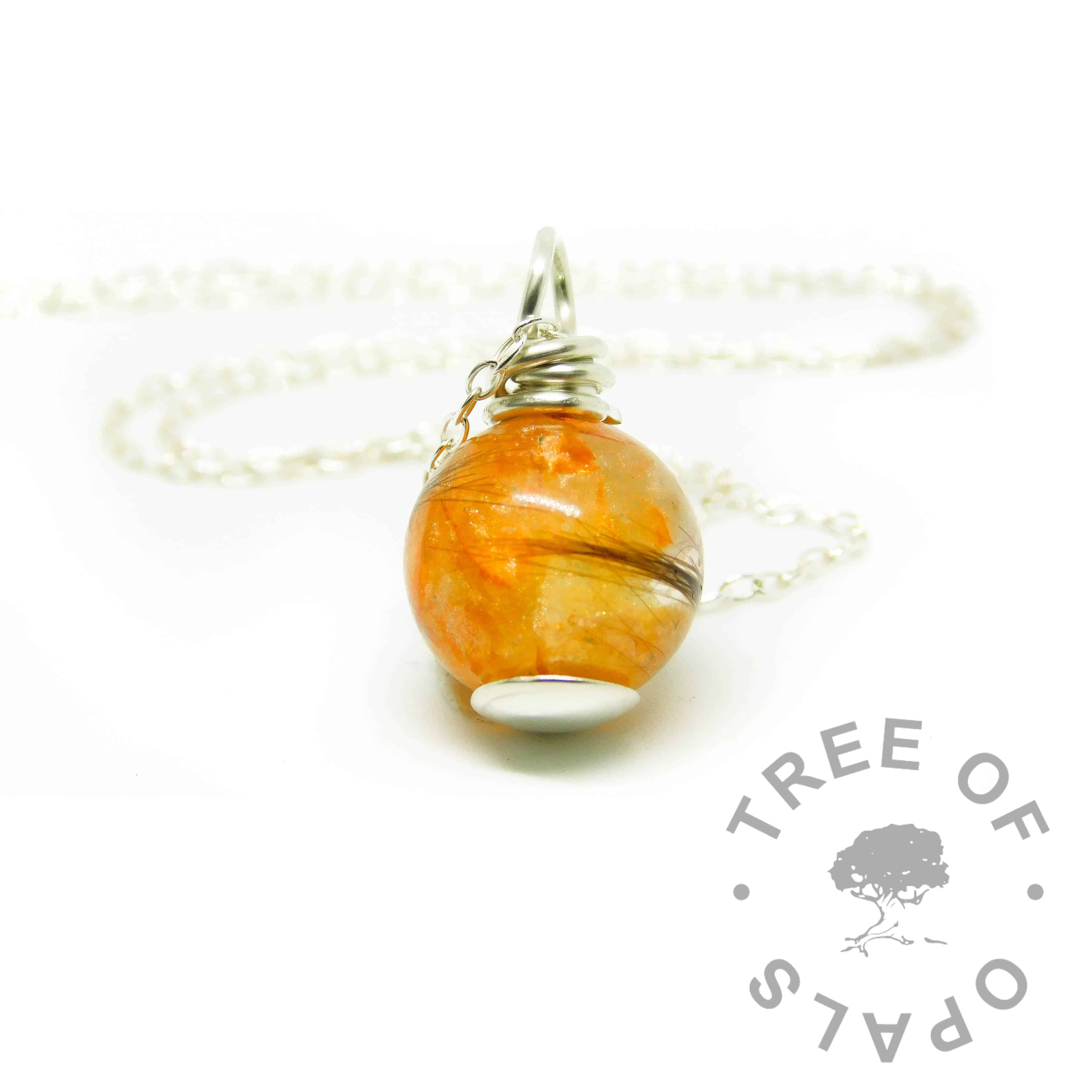 tangerine orange lock of hair pearl with smooth base and wire wrapped necklace setting