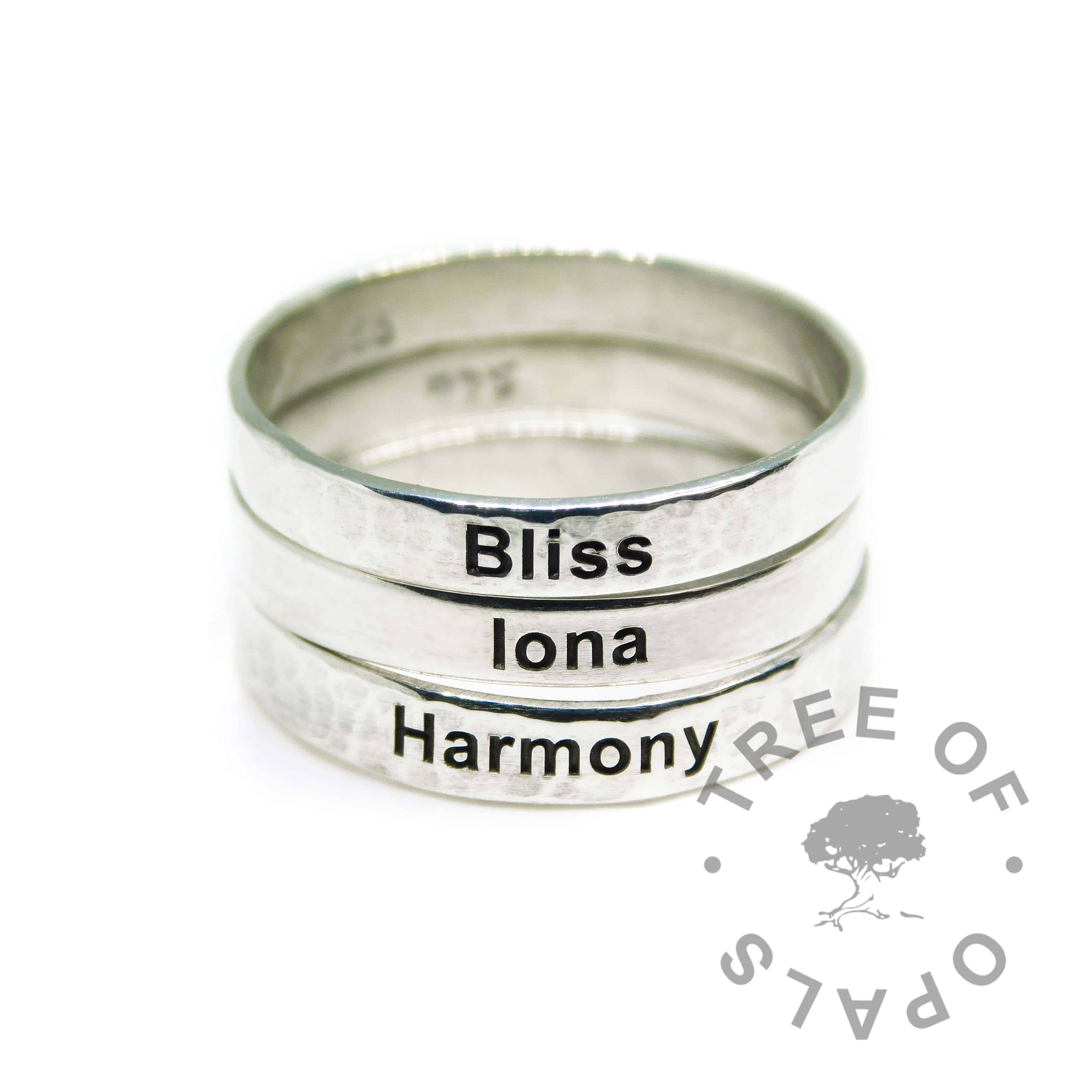 engraved ring stack, textured, brushed, textured. Memorial rings from Tree of Opals with solid sterling EcoSilver band. Engraved on the outside in Arial font