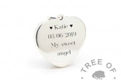 New style heart necklace setting back, with Silver South Serif font and heart emojis engraving mockup (shown without necklace chain)