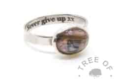 laser engraved inside lock of hair ring with 10x8mm cabochon "stone" with hair, fairy pink sparkles and blue topaz December birthstone on a brushed 3mm wide solid sterling silver band