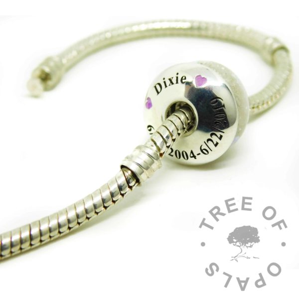 cremation ash charm unicorn resin sparkle mix, and an engraved charm washer on a Pandora bracelet style chain. ashes charms with solid silver cores