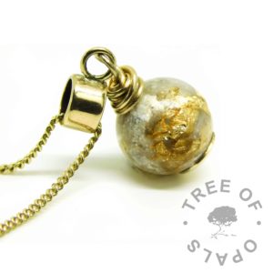 Precious Metal Leaf Addition solid gold ashes pearl with 9ct gold European setting, shown on a medium-heavy 9ct yellow gold chain upgrade. Unicorn white resin sparkle mix and lots of gold leaf with cremation ashes in resin. Compatible with Chamilia and Pandora bracelets pet cremation jewelry