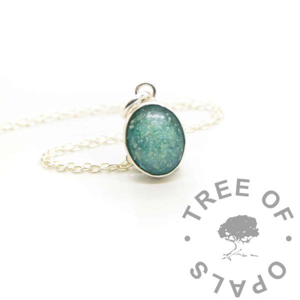 Small necklace setting with ashes, 10x8mm bezel cup, mermaid teal resin sparkle mix. Dad memorial jewellery with ashes