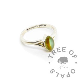 Hannah Lock of Hair Ring Hannah marquise hair ring engraved with arial font and heart emoji. Lock of blonde hair with angelic aqua resin sparkle mix.