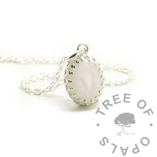 breastmilk crown oval necklace. Pendant setting for keepsake jewellery, small 10x8mm solid sterling silver setting. Breastmilk with no sparkles or boobie awards, swirled milk. Jump ring and chain included