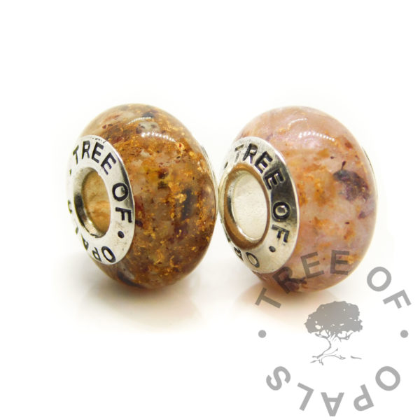 umbilical cord bead duo with rose gold leaf and red pearlescent. Medium bead settings for keepsake jewellery, custom bead core design A+B solid sterling silver setting.