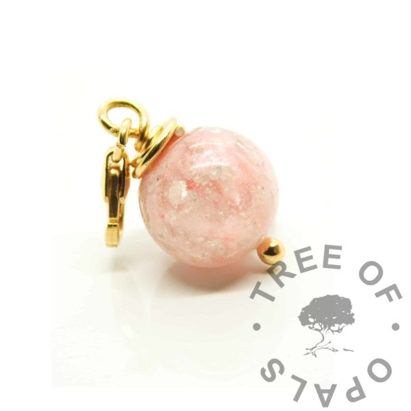 gold fairy pink breastmilk orb dangle charm. Breastmilk pearl with subtle fairy pink resin sparkle mix, a touch of silver leaf and genuine diamond dust. Set as an 11mm orb wire wrapped with a gold vermeil ball headpin - solid sterling silver plated with yellow gold. Gold vermeil carabiner clasp for gold Thomas Sabo style large link bracelets