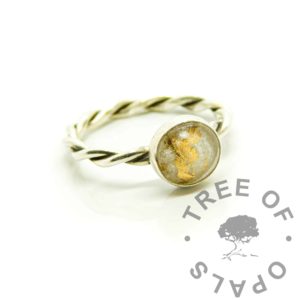 breastmilk gold ring, solid silver twist band setting. Breastmilk with 23ct gold leaf