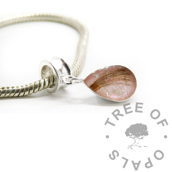 13x9mm teardrop bezel European dangle charm for Pandora style bracelet with lock of hair and pastel pink resin sparkle mix with white gold leaf. 925 solid sterling silver handmade with bezel tray for filling or direct pour. Keepsake jewellery making memorial memento and breastmilk jewelry