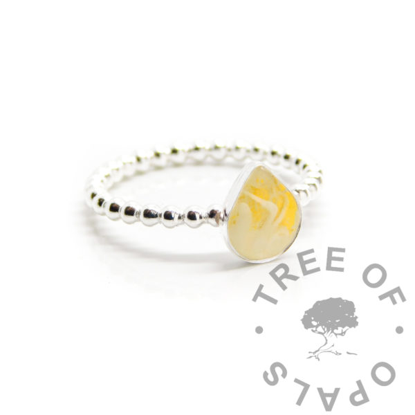 breastmilk with yellow gold leaf teardrop ring, solid silver ring shank pearl or bubble wire. 8x6mm teardrop bezel with direct pour breastmilk jewellery with genuine gold leaf behind swirled milk. Handmade breastfeeding keepsake or breastmilk jewelry ring. Digital image mockup