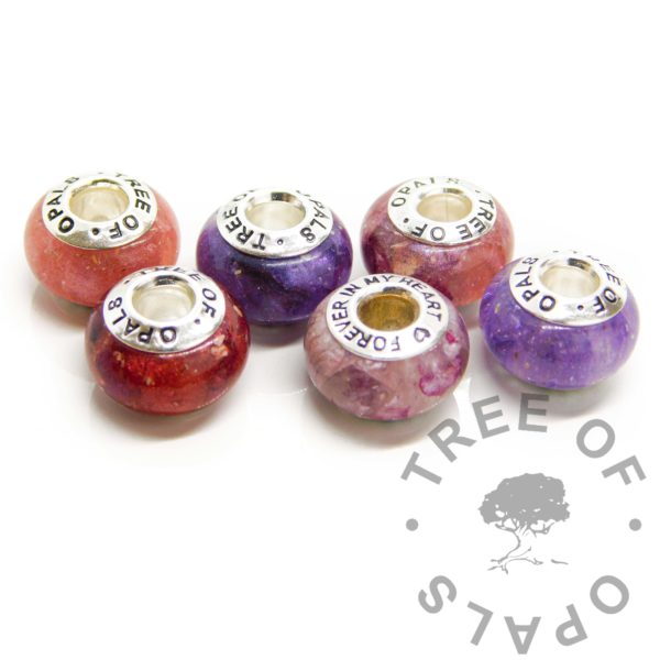 cremation ashes beads family order, solid sterling silver with fairy pink resin sparkle mix and red rose petals with dark pink red. Various beads with reds, pinks and purples. Handmade memorial jewelry set of six beads