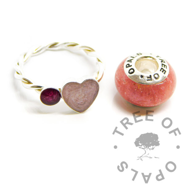 cremation ashes heart and round ring, solid sterling silver with anti tarnish band. 8mm heart and 3mm round setting, cremation ashes with fairy pink resin sparkle mix and red rose petal with dark pink red. Deep pink ashes ring. Handmade memorial jewellery set