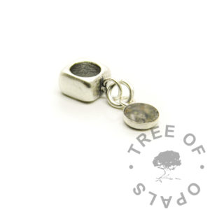 square dangle bail ashes matte, matte ashes dangle charm. Solid silver keepsake memorial jewelry, keyring or dangle charm for large hole bead bracelets. 6mm round bezel setting with loop. Classic cremation ashes no colour or sparkle, matt or brushed effect silver and resin. Seaglass effect ashes jewellery