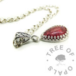 red ashes teardrop necklace. Dragon's blood red resin sparkle mix and red alcohol ink. 18x13mm crown teardrop necklace with celtic bail and 2.4mm rolo chain