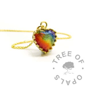 Gold Hair Crown Heart Necklace Solid Gold Hair Heart Necklace Solid Gold Ashes Heart Necklace solid gold rainbow ash heart solid 14ct yellow gold hallmarked and handmade mockup. Cremation ashes in resin with resin sparkle mix colours. Solid gold crown point open back necklace setting shown with chain upgrade, 10mm heart setting