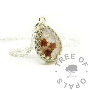 Umbilical Cord Crown Teardrop Necklace Cord Necklace solid sterling silver umbilical cord necklace. 14x10mm crown point setting. Resin baby keepsake bead with umbilical cord stars and unicorn white resin sparkle mix in a galaxy effect