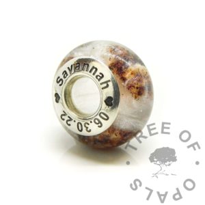 engraved umbilical cord bead. S925 solid recycled sterling silver charm bead liner. Resin baby keepsake bead with umbilical cord stars and unicorn white resin sparkle mix in a galaxy effect. Engraved with arial font with a date and name