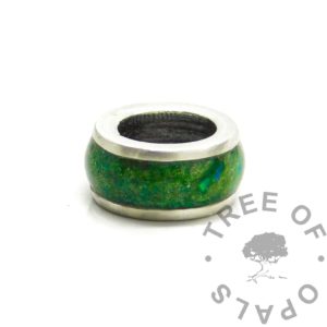 Channel Cremation Bead green ashes medium channel bead setting for European style bracelet. Cremation ashes with a little basilisk green resin sparkle mix synthetic mint green opal flecks. Solid sterling silver 925 setting, medium channel bead.