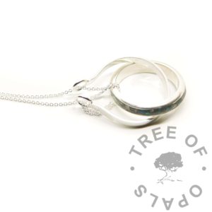 Ring Holder Necklace ring holder pendant with ring, shown with chain, in use. Slide the ring down the inside with the chain and slip it around to hold it in place. Handmade solid silver setting with anti-tarnish horseshoe shaped main piece