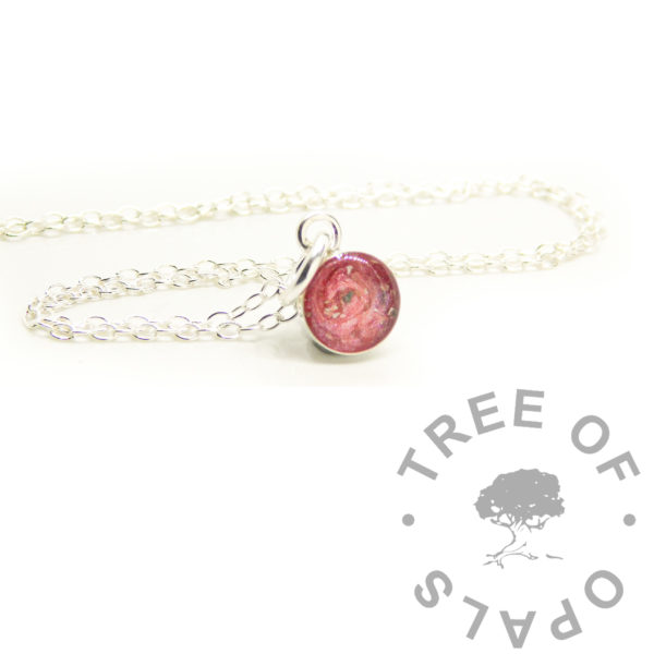 Solid silver ashes bezel necklace with pink sparkle mix. Made from solid sterling silver. Memorial keepsake jewelry. 6mm round pendant, with 20"/50cm solid silver chain. Fairy pink resin sparkle mix