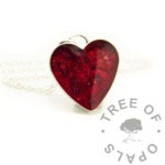 Solid silver ashes heart necklace with red sparkle mix and January birthstone colour. Made from solid sterling silver. Memorial keepsake jewelry. Dragon's blood red resin sparkle mix and crushed red garnet style glass. 16mm heart bezel necklace with 20"/50cm solid 925 chain