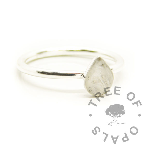 silver teardrop breastmilk ring, resin teardrop 8x6mm ring. Made from solid sterling silver with a classic round band. Birth and breastfeeding keepsake jewelry with silver leaf