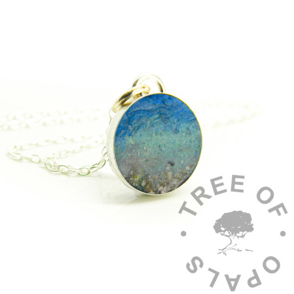 Round Cremains Necklace ash round necklace with beach scene, solid sterling silver 925 jewellery. Cremation ashes as the sand, and resin sparkle mix in 12mm round bezel necklace setting shown with chain. Handmade memorial jewelry made in the UK. Photo mockup