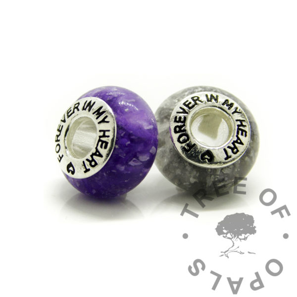 ashes bead duo with blank core purple and silver sparkle. Cremation ashes memorial jewellery with solid sterling silver bead core. Medium bead 925 keepsake jewelry with orchid purple and dolphin silver resin sparkle mixes