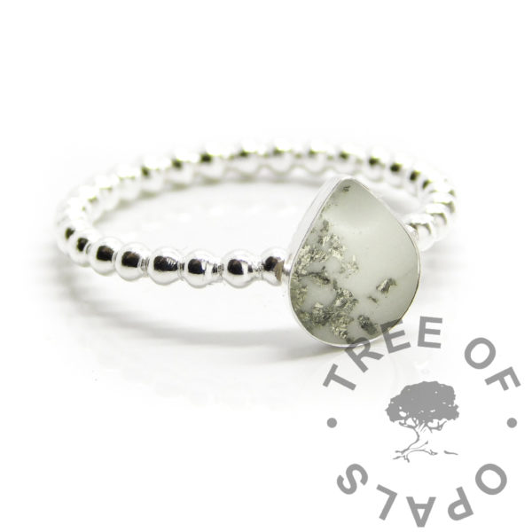 Platinum leaf breastmilk teardrop bubble band ring. Solid silver handmade ring with teardrop shaped bezel cup for direct pour. Milk and genuine platinum leaf in resin for 18 month breastfeeding award. 2mm pearl wire with 8mm pear shape cup, breastfeeding keepsake memento